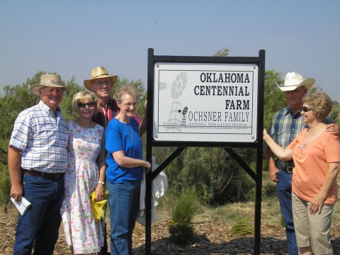 Grandchildren at the sign unveiling